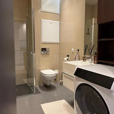 Апартаменти Modern With Private Parking